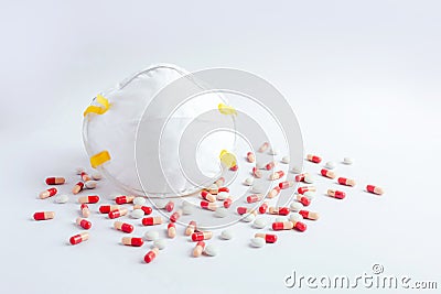 Pills all over a white plane and red with Mask Stock Photo