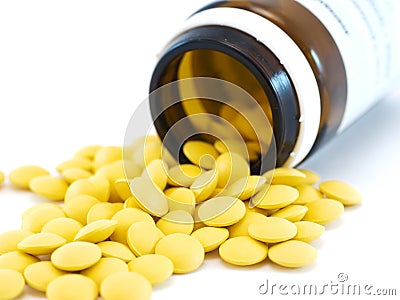 Pills with brown glass phial Stock Photo