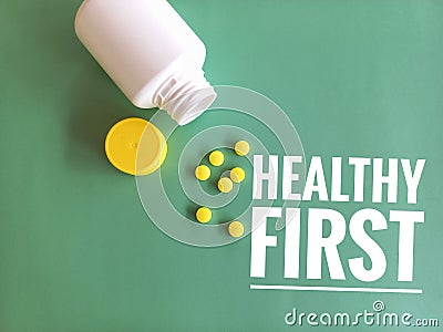 pills on the green background Stock Photo