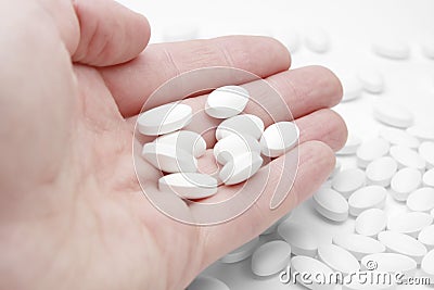 Pills in hand, generic drugs Stock Photo