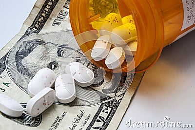 Pills and money Stock Photo