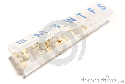 Pills in pillbox Stock Photo