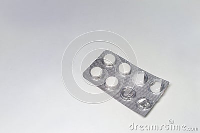 Pills plate of antibiotics. clipped and half-empty Stock Photo