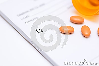 Pills on a prescription pad Stock Photo