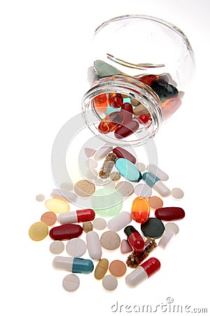 Pills spilling Stock Photo