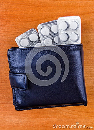 Pills in the Wallet Stock Photo