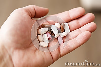 Pills in woman hand, drug addiction Stock Photo