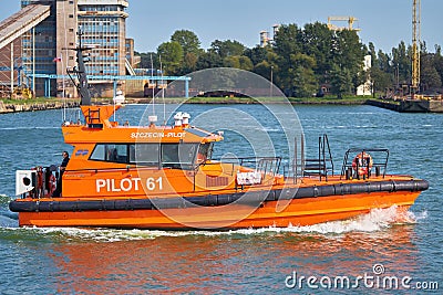 Pilot boat entering the port of Swinoujscie Editorial Stock Photo