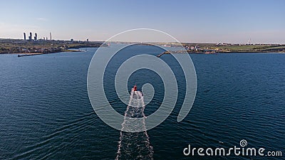 Pilot boat at sea in the port water area. Aerial view Editorial Stock Photo