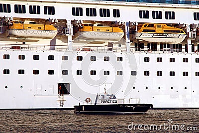 Pilot cutter maneuvering with a big cruise. Editorial Stock Photo