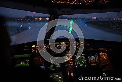 Pilot`s hand accelerating on the throttle in airplane flight cockpit during takeoff Stock Photo