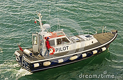 Pilot Ship in a Modern Harbour Editorial Stock Photo