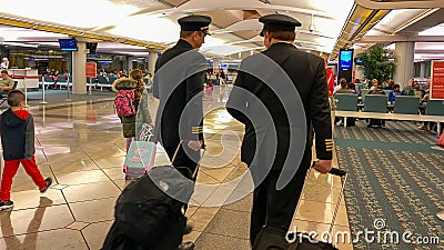 Pilots in a Delta gate preparing to fly out to their destination at the Orlando International Airport Editorial Stock Photo