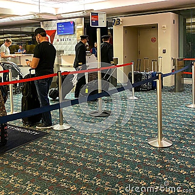 Pilots in a Delta gate preparing to fly out to their destination at the Orlando International Airport Editorial Stock Photo