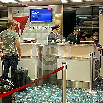 Pilots in a Delta gate preparing to fly out to their destination at the Orlando International Airport Editorial Stock Photo