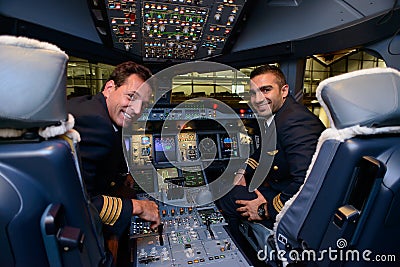 Pilots in Emirates Airbus A380 aircraft after landing Editorial Stock Photo