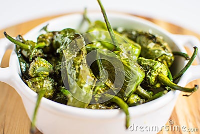 Fried Green Padron Peppers in White Bowl Stock Photo