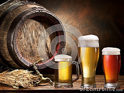 Pin of beer and glass of beer. Stock Photo