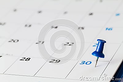 Pin on calendar on 30th of the month Stock Photo