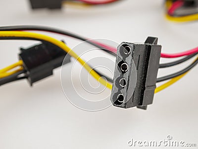 4-pin power connector for all PATA hard disk drives and optical disk drives, peripherals and case fans, selective focus, plug Stock Photo