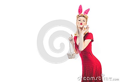 Pin up Easter. Lovely woman in rabbit costume. Happy woman preparing for Easter. Pinup woman in bunny ears with Easter Stock Photo