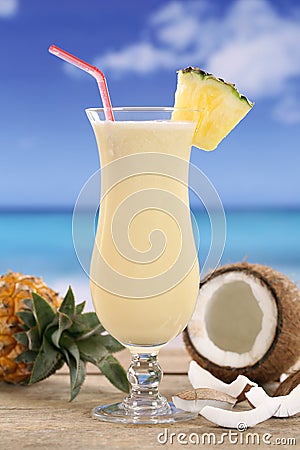 Pina Colada cocktail with fruits on the beach Stock Photo