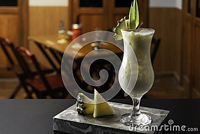 Pinacolada cocktail is on the bar. Space for text. Photo for the menu Stock Photo