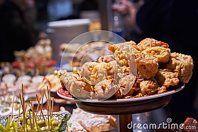 Pinchos and tapas typical of the Basque Country, Spain. Selection of different types of foods to choose from. San Sebastian Stock Photo