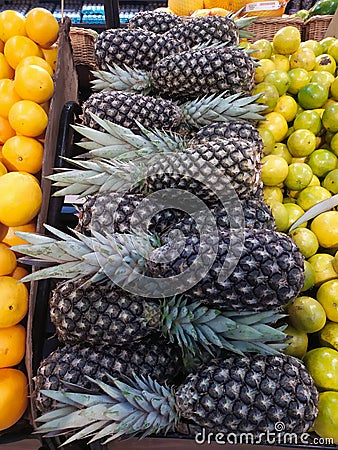 Pineapple being sold at the fair Stock Photo