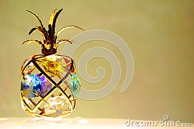Pineapple figurine with colored glass Stock Photo