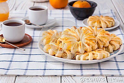 Pineapple ringlets in puff pastry, baked in the form of flowers Stock Photo