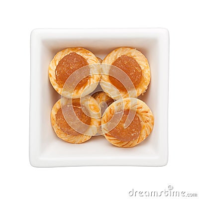 Pineapple tarts in square bowl Stock Photo