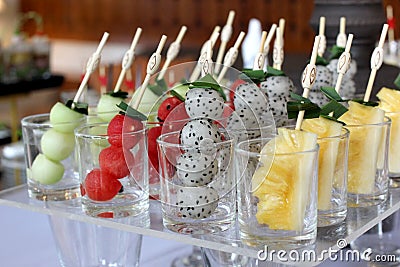 Pineapple watermelon melon and dragon fruit on buffet line Stock Photo