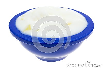 Pineapple yogurt in a blue dish Stock Photo