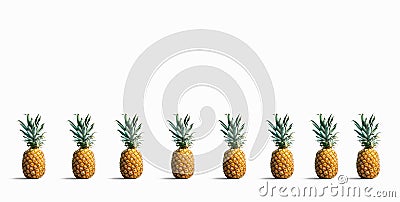 Pineapples on a solid color background Stock Photo