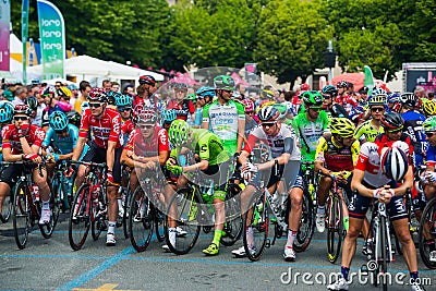 Pinerolo, Italy May 27, 2016; Group professional cyclist in the front row ready to start for the hard mountain stage Editorial Stock Photo