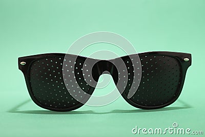 Pinhole glasses for eyes theraphy Stock Photo