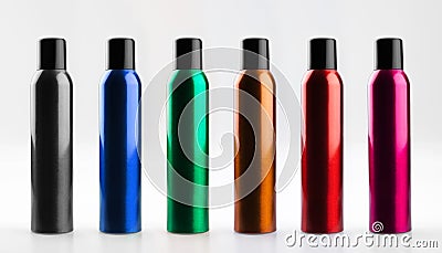 Set of colorful, beauty aerosol cans of aluminum with caps. Cosmetic hairspray bottles. Isolated on white background. Stock Photo