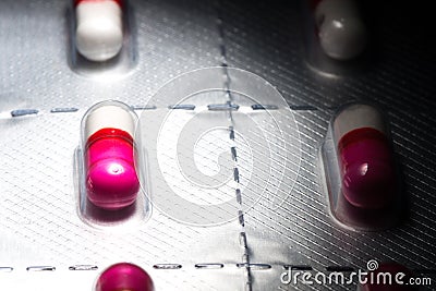 Pink antihistamine capsules in blister pack Stock Photo