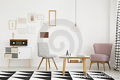 Pink armchair in living room Stock Photo