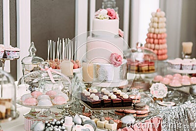 Pink assortie of the cakes and cupcakes Stock Photo