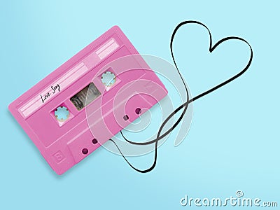 Pink audio cassette tape with label tag love song tangled tape Stock Photo