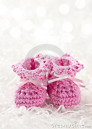 Pink baby crochet shoes Stock Photo