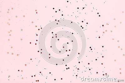 Pink background with red star glitter. Stock Photo