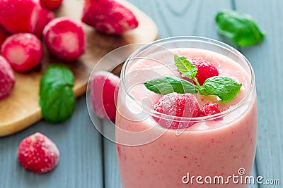 Pink Berry Smoothie with Frozen Strawberries and Mint Stock Photo