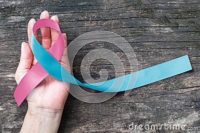 Pink blue ribbon awareness isolated with clipping path bow color for newborn birth defect, Sudden Infant Death Syndrome SIDS Stock Photo