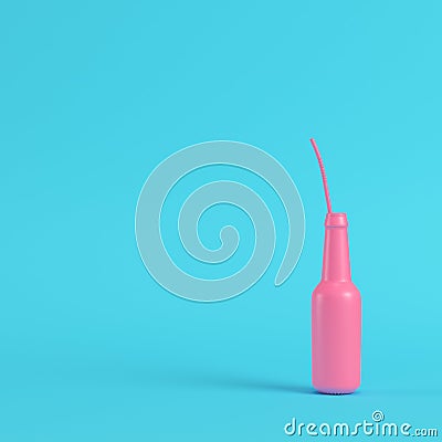 Pink bottle with straw on bright blue background in pastel color Stock Photo