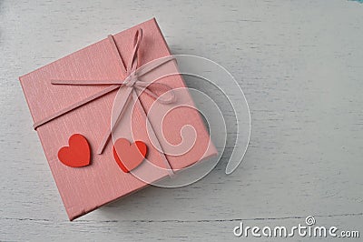 Pink box and love shapes with cope space for the text Stock Photo