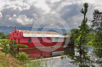 Pink church in the middle of nowhere, Guatemala Stock Photo