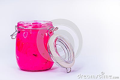 pink color of plastisol ink in white background fill in transparent bottle Stock Photo